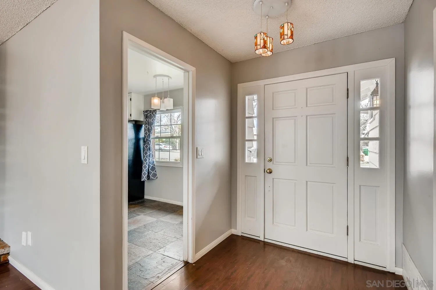 9340 Oakbourne Road Santee, CA 92071 - Photo 4 of 26 wooden floor with white walls