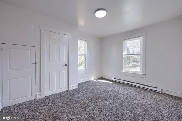 an empty room with windows