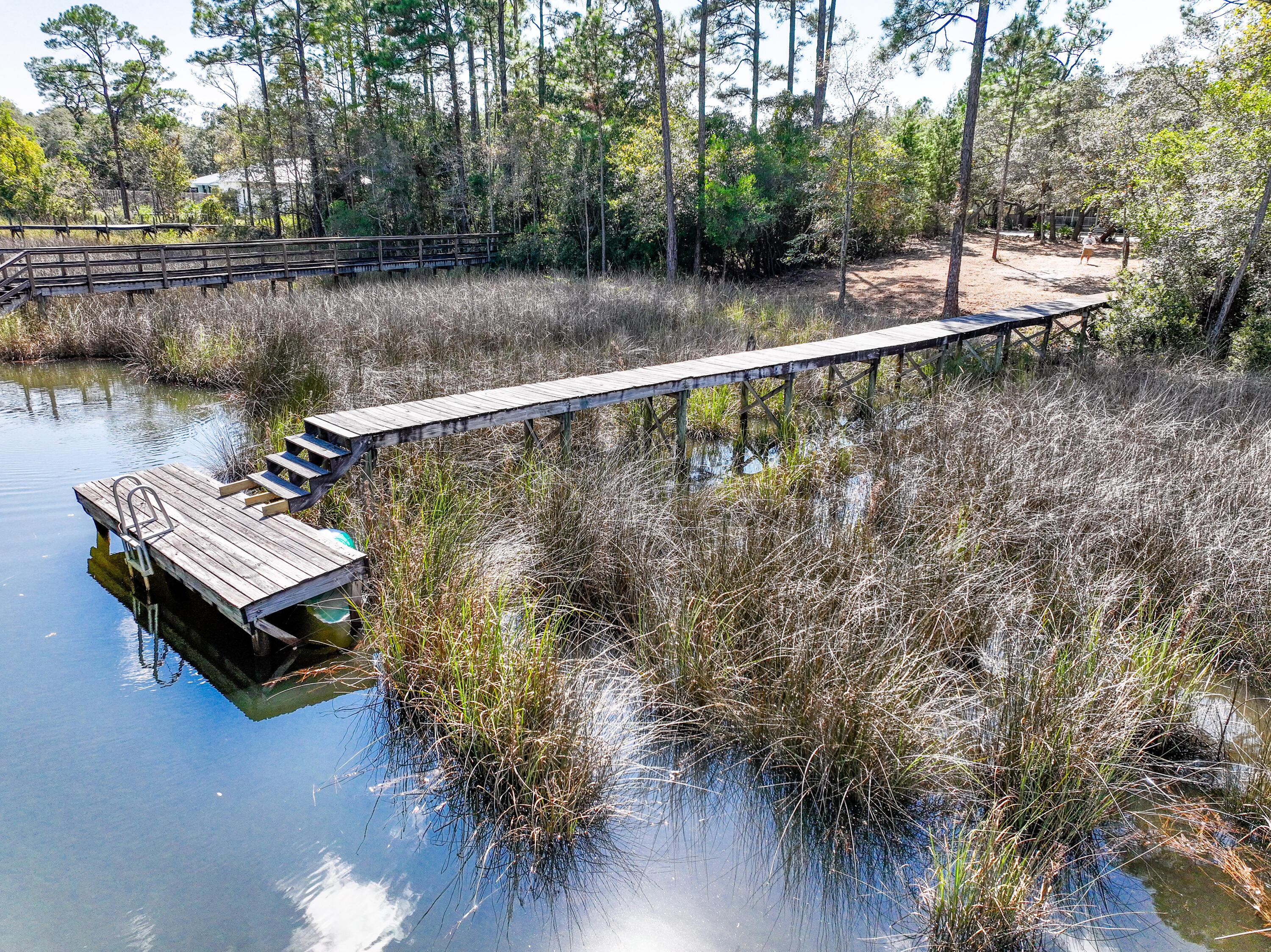 212 Pisces Drive Santa Rosa Beach, FL 32459 - Photo 12 of 17 a view of a lake with a yard and sitting area