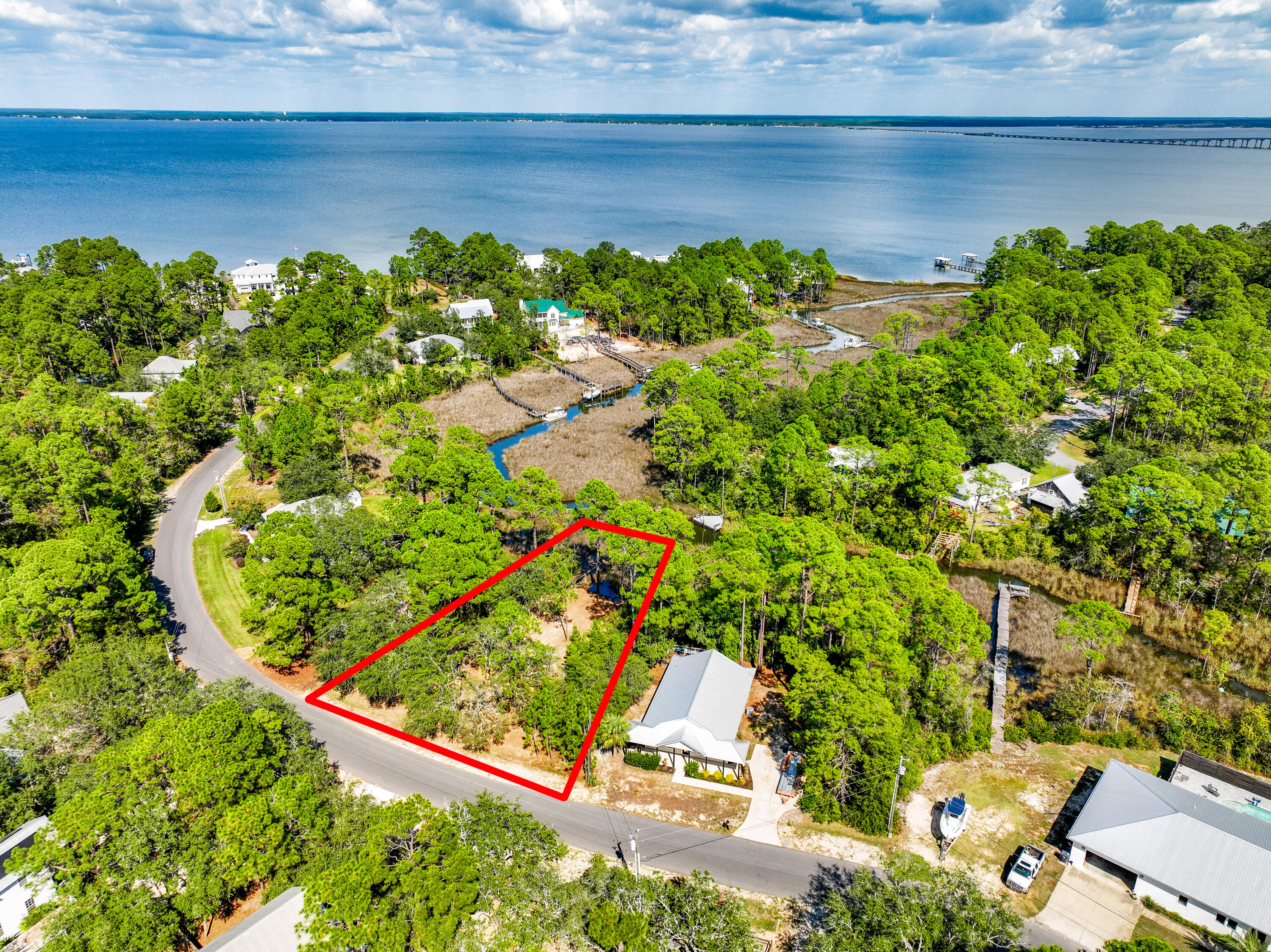212 Pisces Drive Santa Rosa Beach, FL 32459 - Photo 7 of 17 a view of a garden with a bench
