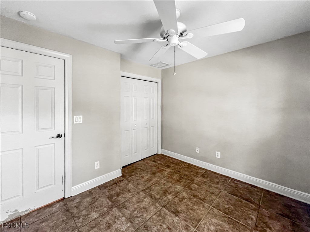 13437 First Street Fort Myers, FL 33905 - Photo 15 of 22 wooden floor in an empty room