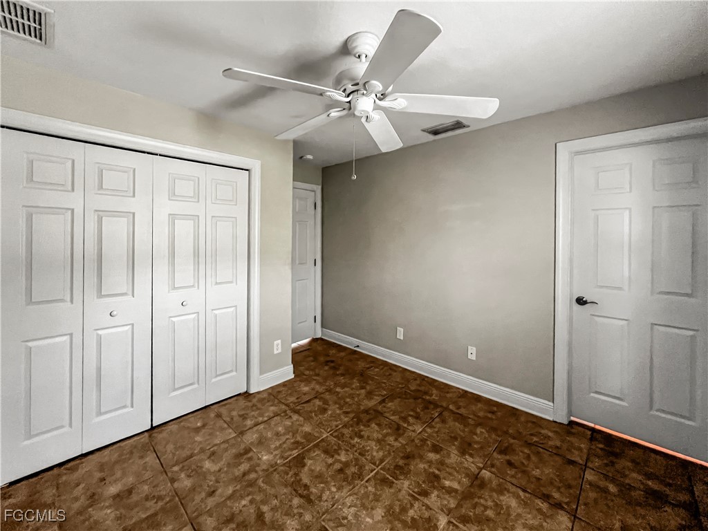 13437 First Street Fort Myers, FL 33905 - Photo 16 of 22 wooden floor in an empty room
