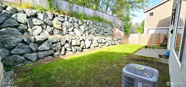 a view of yard with seating space