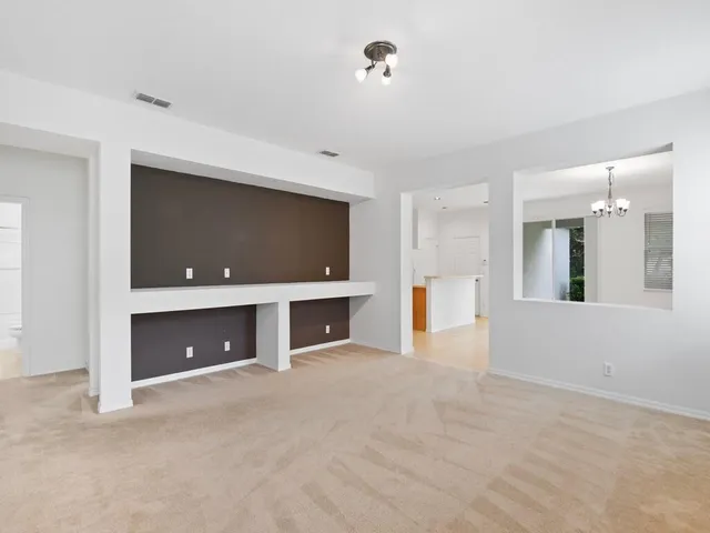 a view of a livingroom with a flat screen tv