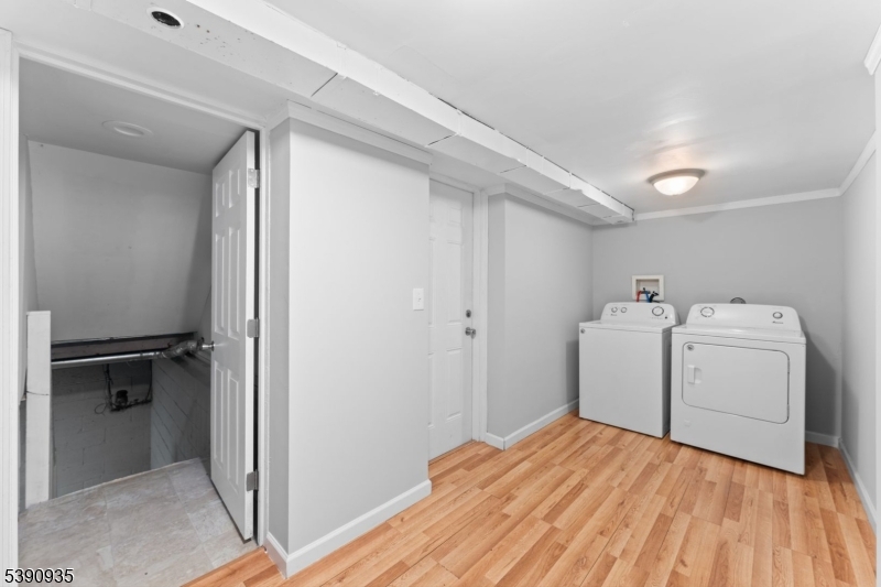 87 Pompton Avenue Little Falls, NJ 07424 - Photo 25 of 34 a room with a washer and dryer