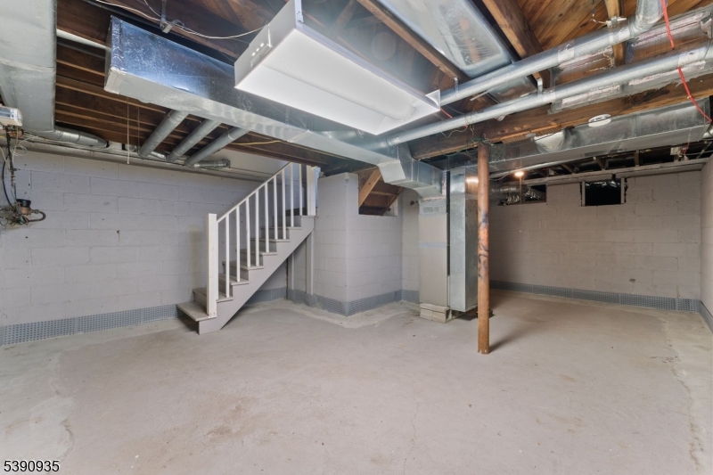 87 Pompton Avenue Little Falls, NJ 07424 - Photo 27 of 34 a view of an empty room