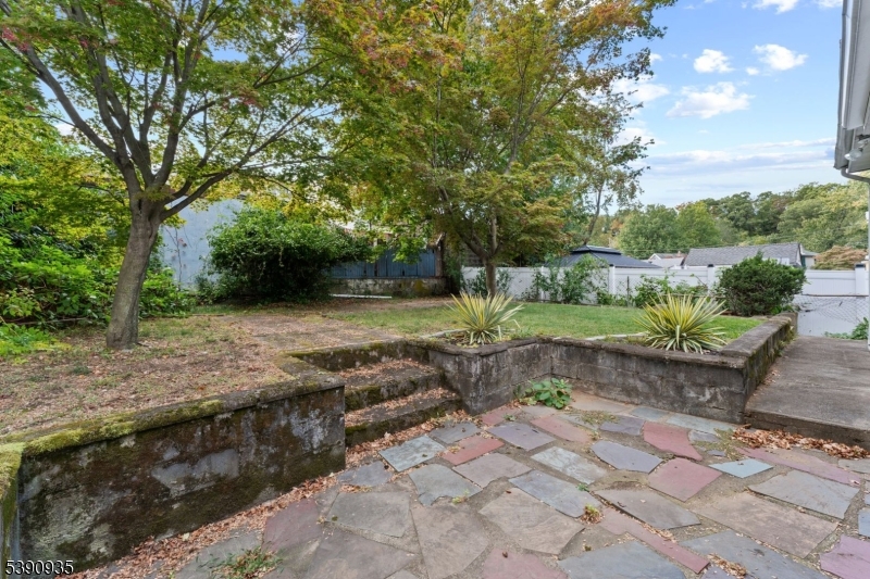87 Pompton Avenue Little Falls, NJ 07424 - Photo 31 of 34 a view of a backyard with green space