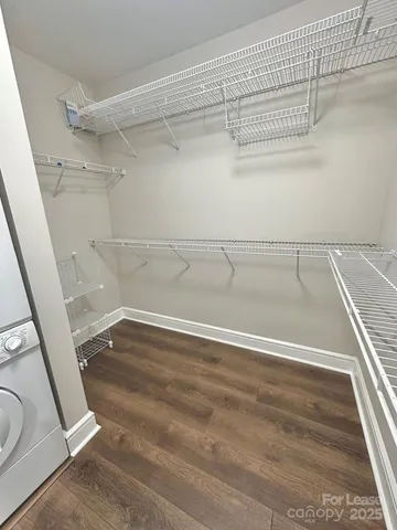 a view of a room with racks on the wall