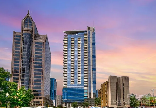 a view of a city with tall buildings