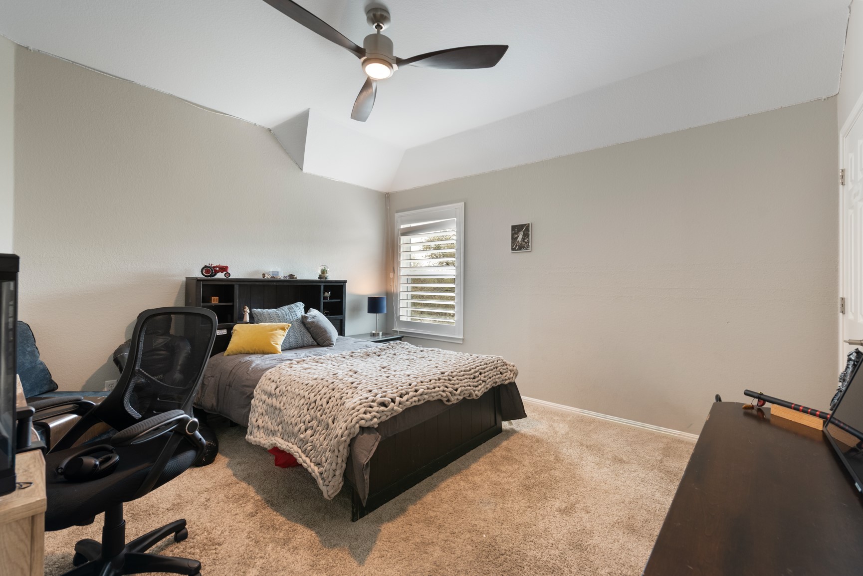 664 Ranchers Club Lane, Unit 1 Driftwood, TX 78619 - Photo 17 of 40 a bedroom with bed and window