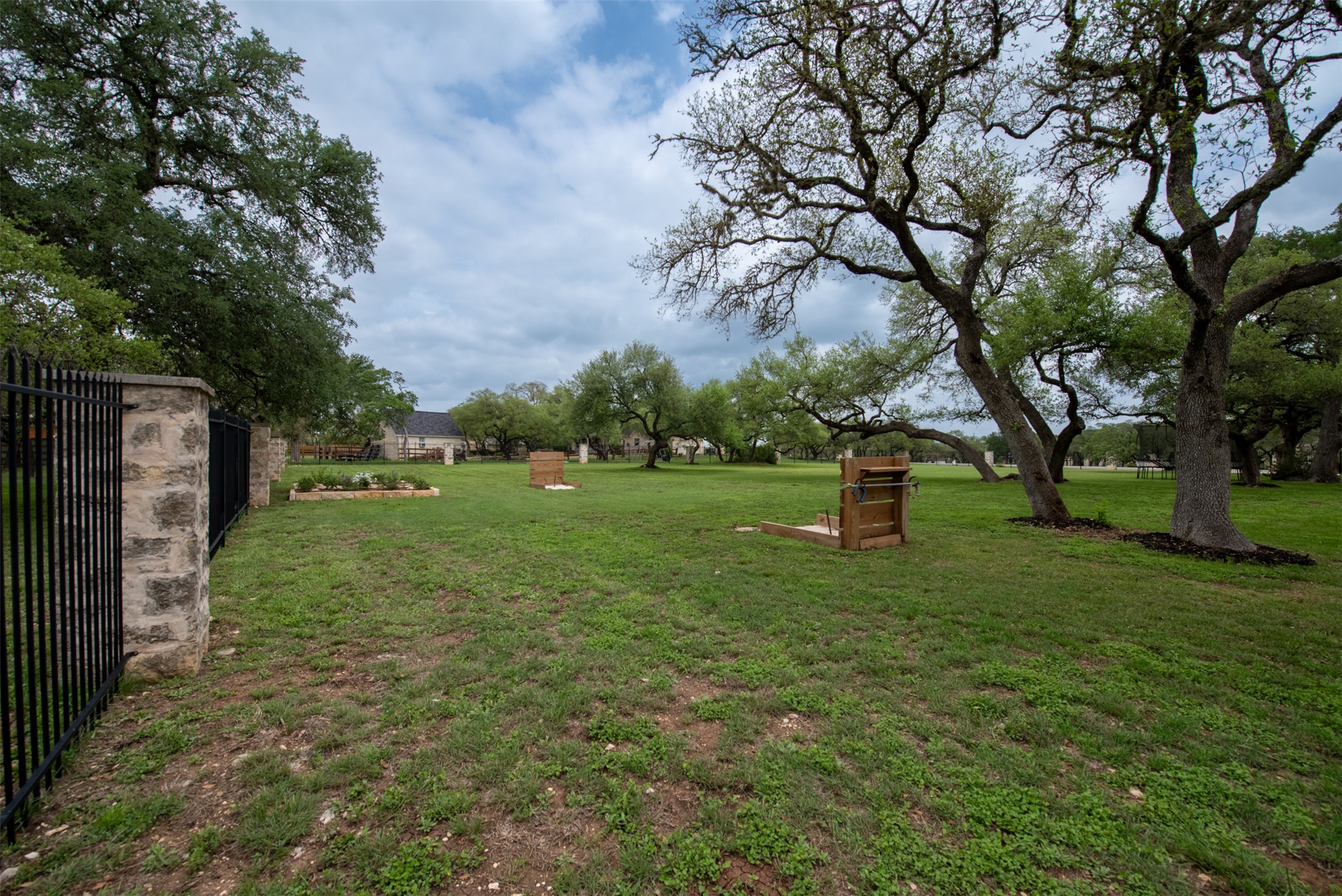 664 Ranchers Club Lane, Unit 1 Driftwood, TX 78619 - Photo 31 of 40 a view of a park with large trees