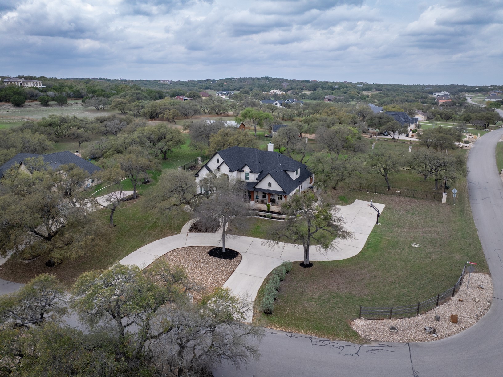 664 Ranchers Club Lane, Unit 1 Driftwood, TX 78619 - Photo 35 of 40 an aerial view of a house with a yard