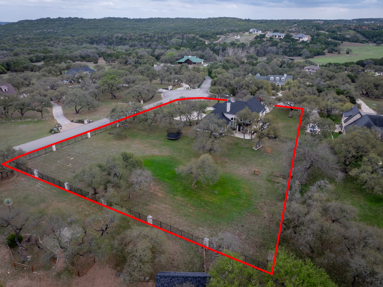 664 Ranchers Club Lane, Unit 1 Driftwood, TX 78619 - Photo 36 of 40 an aerial view of a houses