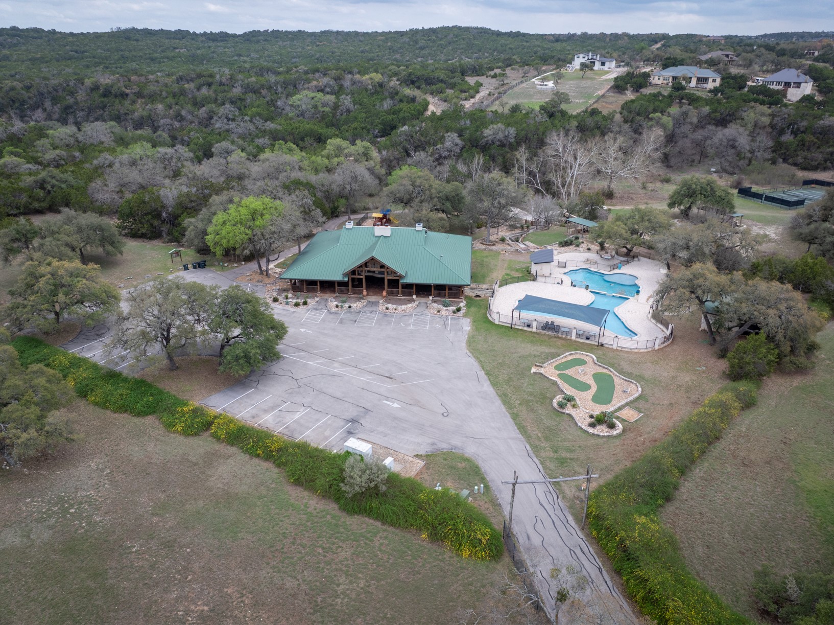 664 Ranchers Club Lane, Unit 1 Driftwood, TX 78619 - Photo 38 of 40 an aerial view of a house with a yard