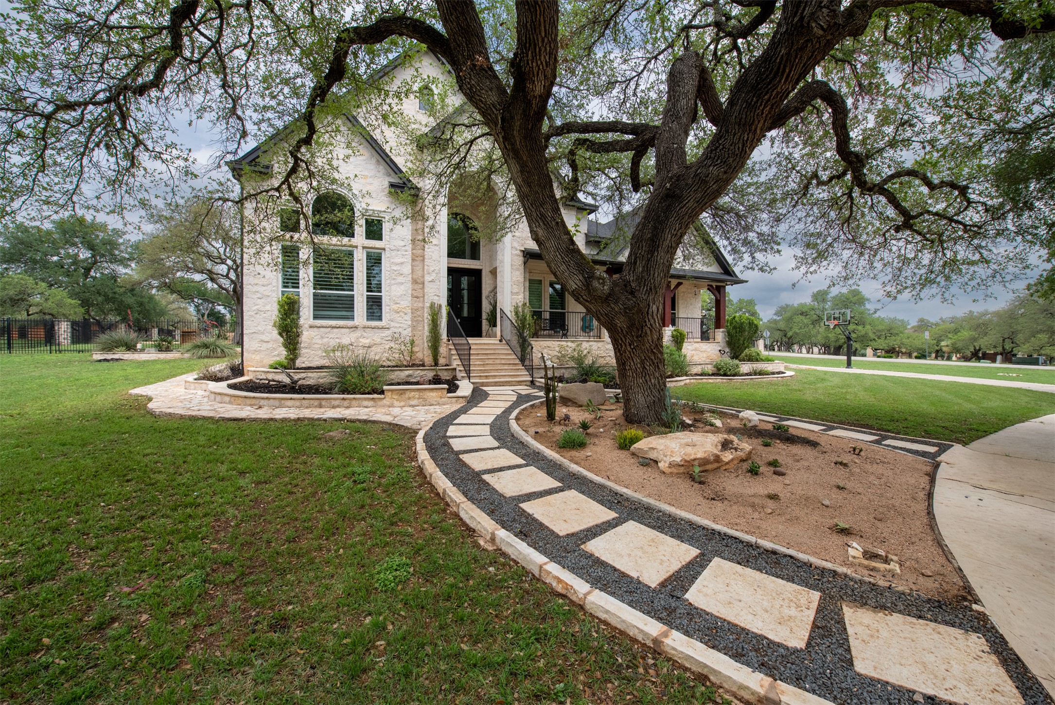 664 Ranchers Club Lane, Unit 1 Driftwood, TX 78619 - Photo 7 of 40 a view of a house with a yard