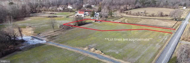 a view of swimming pool with a yard