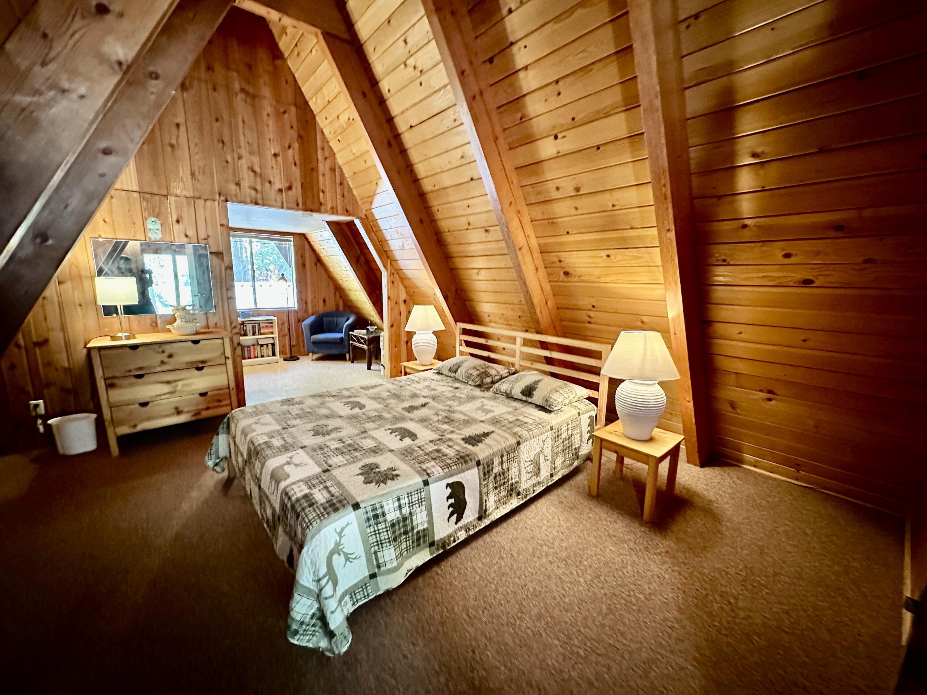 24560 Upper Rim Rock Road Idyllwild, CA 92549 - Photo 33 of 56 a bedroom with a bed and a window