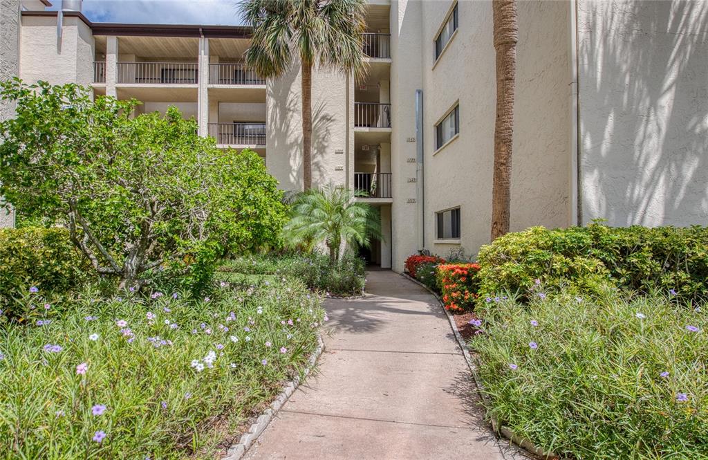 700 Starkey Road, Unit 1145 Largo, FL 33771 - Photo 57 of 63 a view of a pathway both side of house
