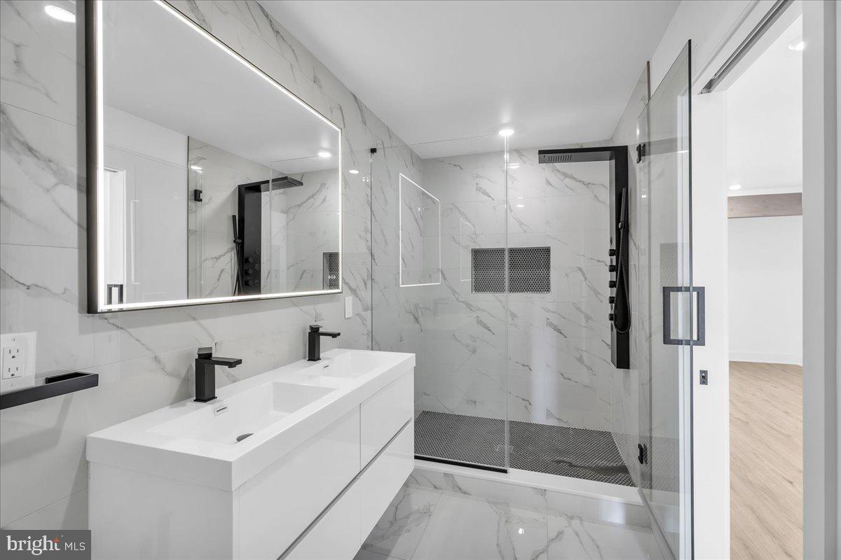 2615 East Boston Street, Unit 2 Philadelphia, PA 19125 - Photo 12 of 24 a bathroom with a sink toilet and shower