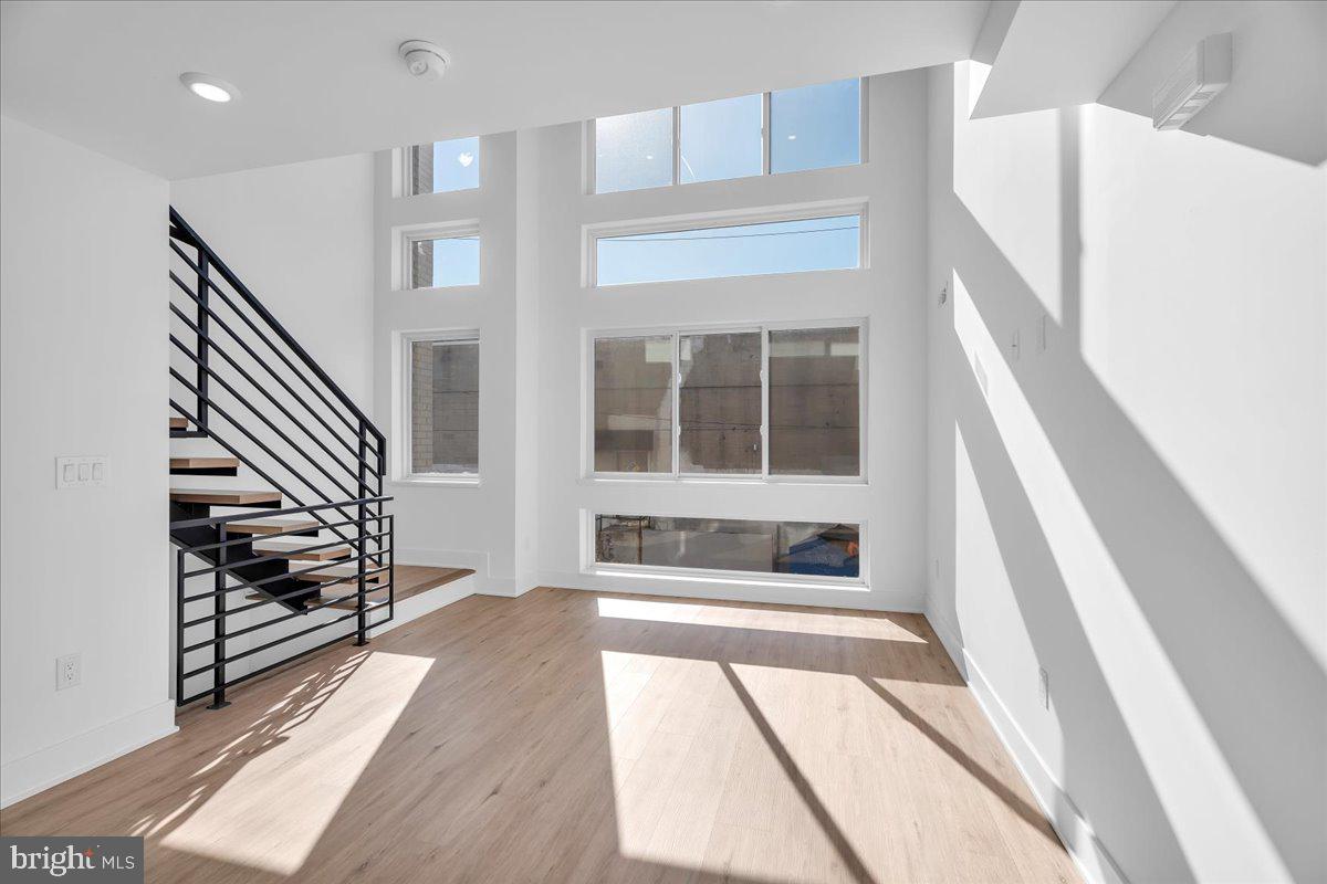 2615 East Boston Street, Unit 2 Philadelphia, PA 19125 - Photo 4 of 24 a view of an entryway with wooden floor and door