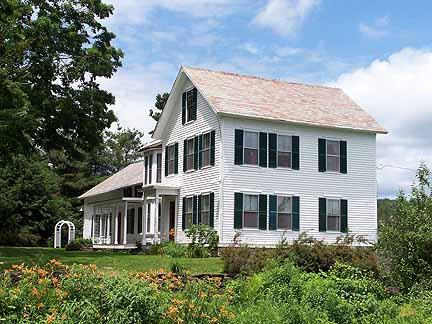 1180 Hawley Road Ashfield, MA 01330 - Photo 1 of 26 a front view of a house with a yard
