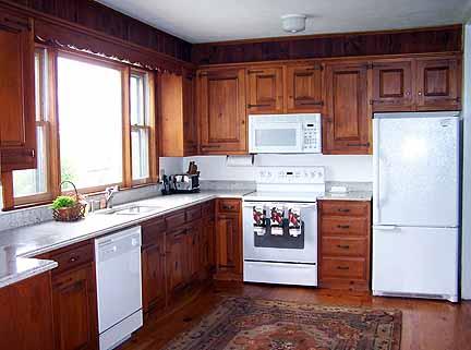 1180 Hawley Road Ashfield, MA 01330 - Photo 13 of 26 a kitchen with stainless steel appliances granite countertop a stove a sink and a refrigerator