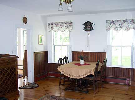 1180 Hawley Road Ashfield, MA 01330 - Photo 14 of 26 a view of a dining room with furniture window and wooden floor