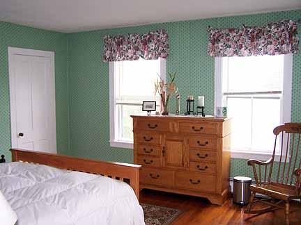 1180 Hawley Road Ashfield, MA 01330 - Photo 19 of 26 a bedroom with a bed and a window