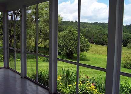 1180 Hawley Road Ashfield, MA 01330 - Photo 4 of 26 a view of a garden from a window
