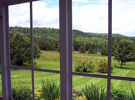 1180 Hawley Road Ashfield, MA 01330 - Photo 5 of 26 a view of a garden from a window