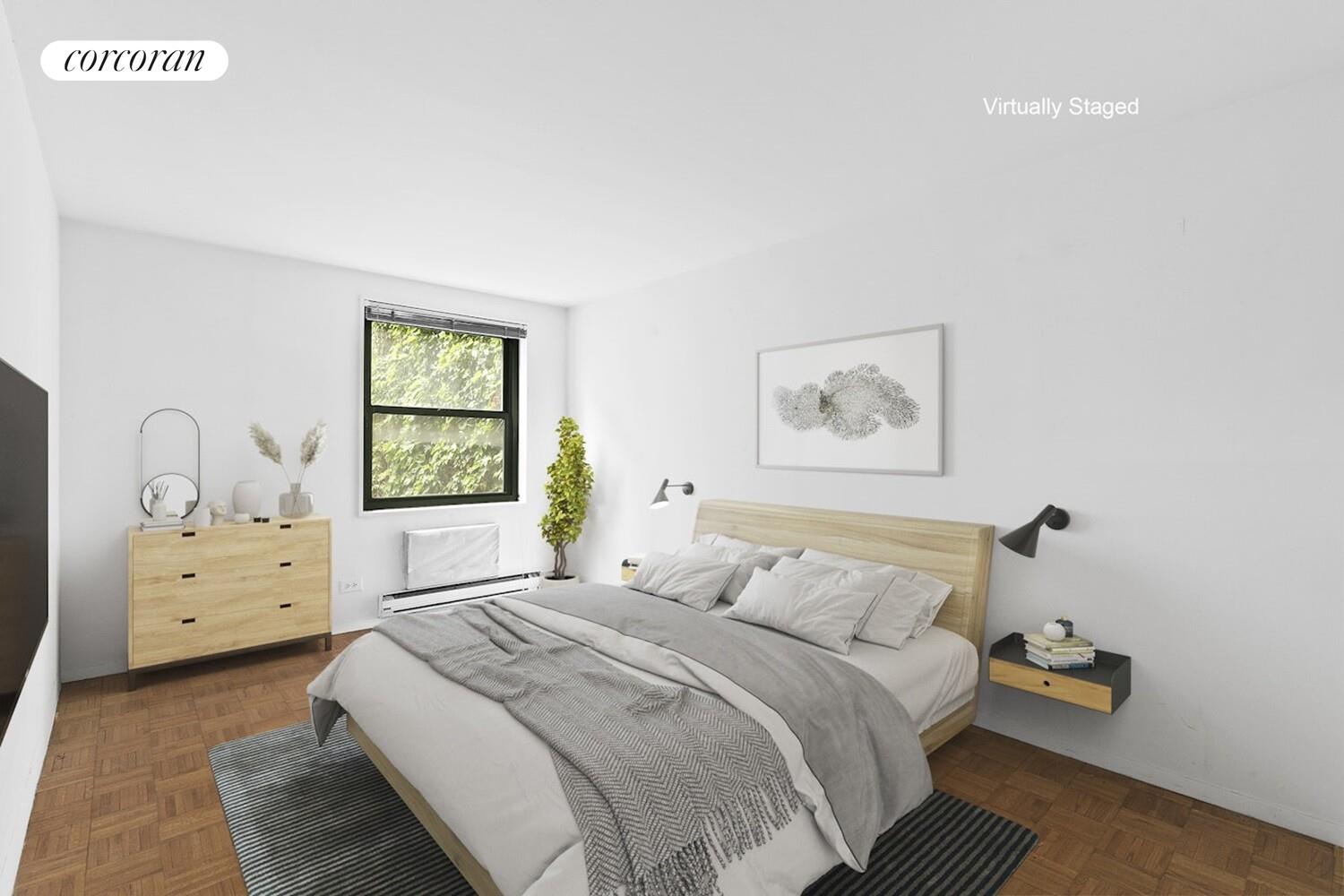 618 Washington Street, Unit GA Manhattan, NY 10014 - Photo 7 of 14 a bedroom with a bed and a window