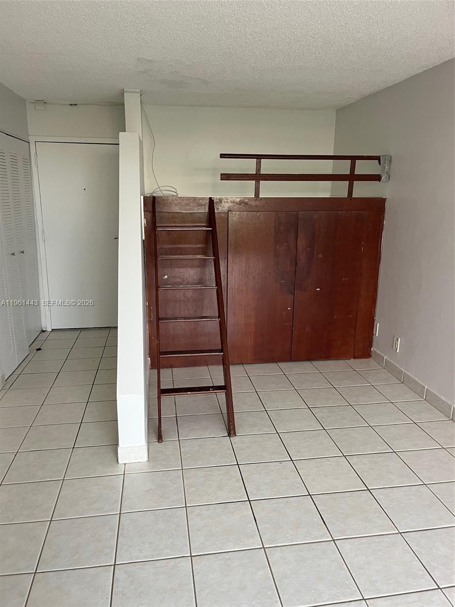17021 North Bay Road, Unit 508 Sunny Isles Beach, FL 33160 - Photo 11 of 22 a view of room with cabinets