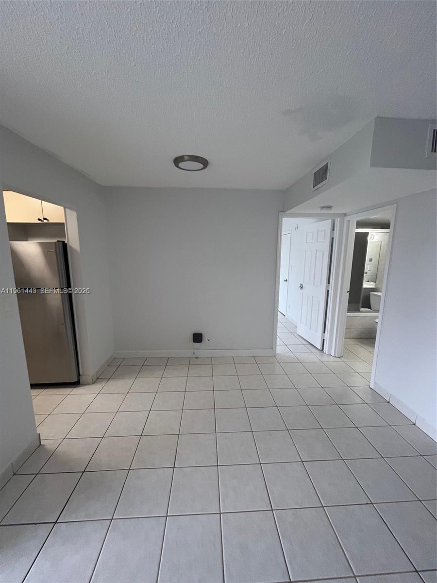 17021 North Bay Road, Unit 508 Sunny Isles Beach, FL 33160 - Photo 16 of 22 a view of a livingroom with an empty space and a sink