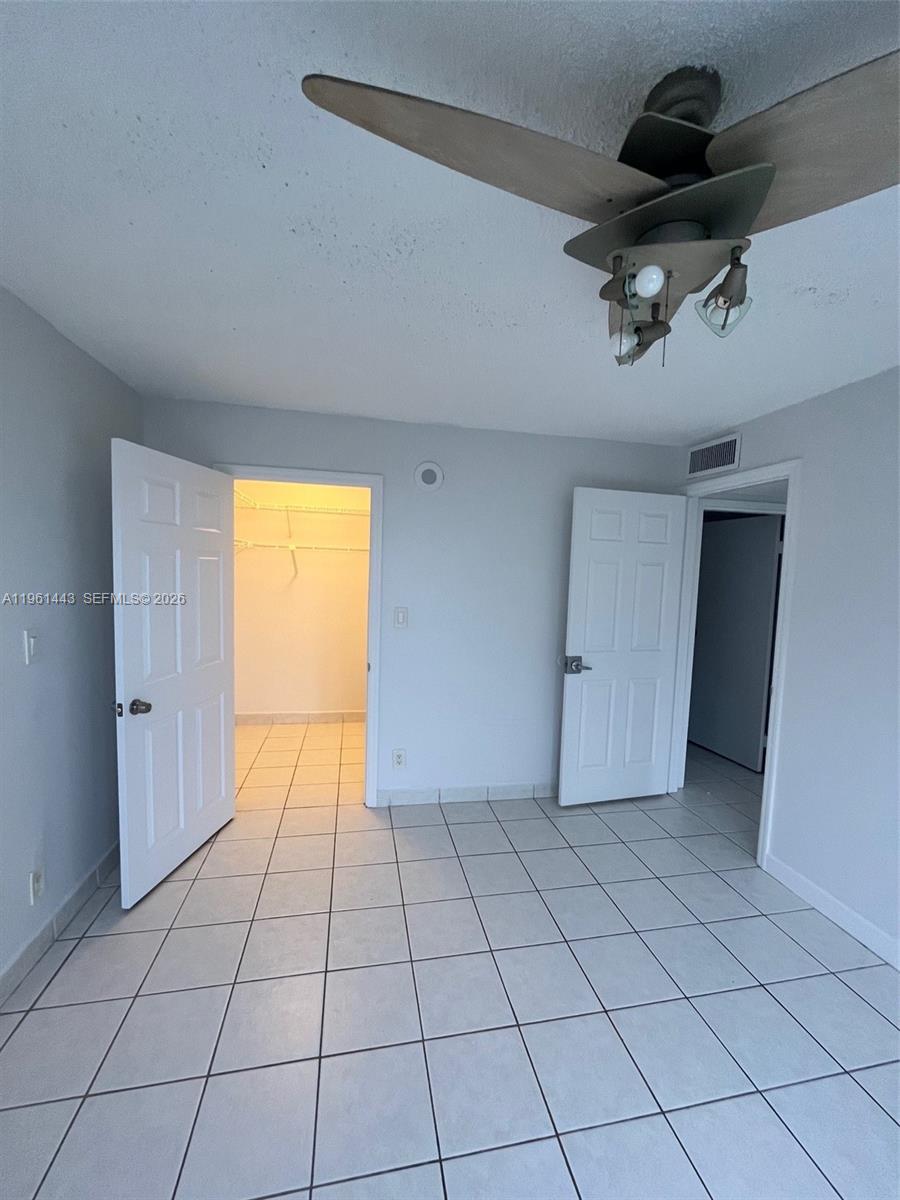 17021 North Bay Road, Unit 508 Sunny Isles Beach, FL 33160 - Photo 20 of 22 a view of an empty room and a window
