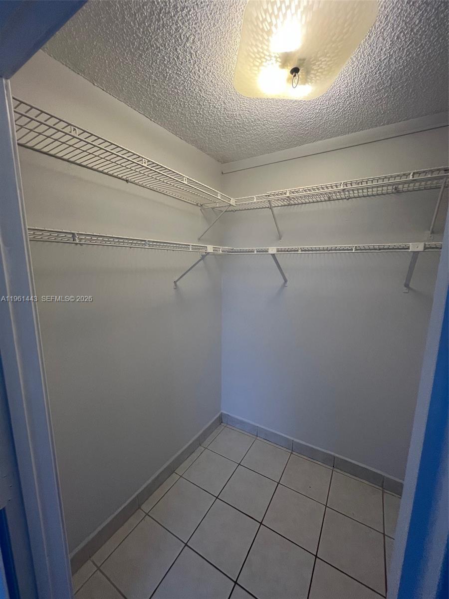 17021 North Bay Road, Unit 508 Sunny Isles Beach, FL 33160 - Photo 22 of 22 a view of a room with racks on the wall