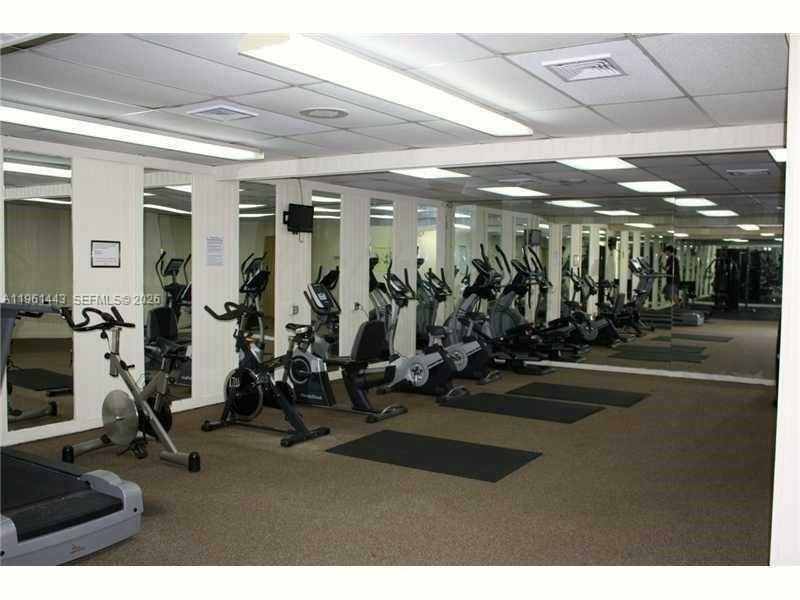 17021 North Bay Road, Unit 508 Sunny Isles Beach, FL 33160 - Photo 5 of 22 a view of a room with gym equipment