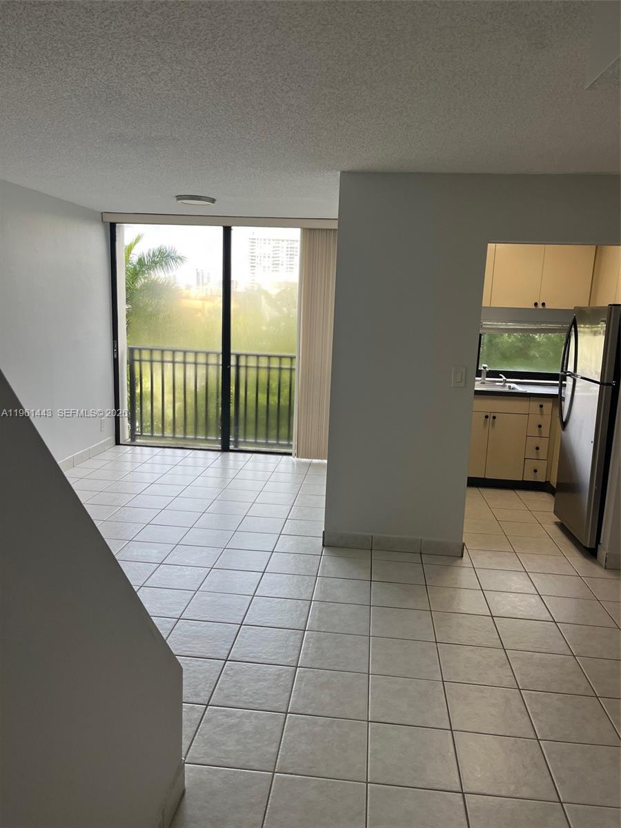 17021 North Bay Road, Unit 508 Sunny Isles Beach, FL 33160 - Photo 8 of 22 a view of a kitchen with an empty space and window