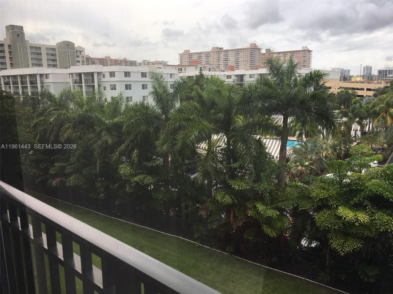 17021 North Bay Road, Unit 508 Sunny Isles Beach, FL 33160 - Photo 10 of 22 a view of a city from a balcony