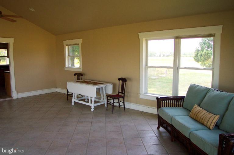 748 Hills Point Road Cambridge, MD 21613 - Photo 24 of 30 Great room with lots of windows