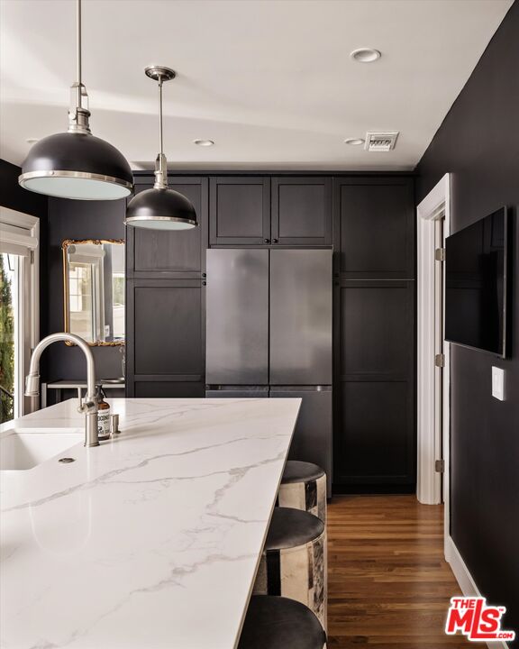 1735 Idlewood Road Glendale, CA 91202 - Photo 13 of 64 a kitchen with a sink and refrigerator