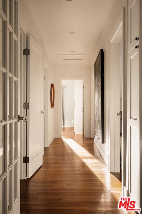 1735 Idlewood Road Glendale, CA 91202 - Photo 16 of 64 a view of a hallway with wooden floor and staircase