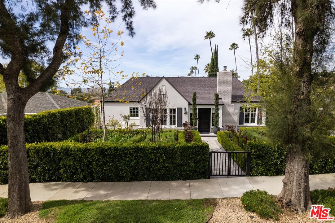 1735 Idlewood Road Glendale, CA 91202 - Photo 2 of 64 a view of a house with a garden