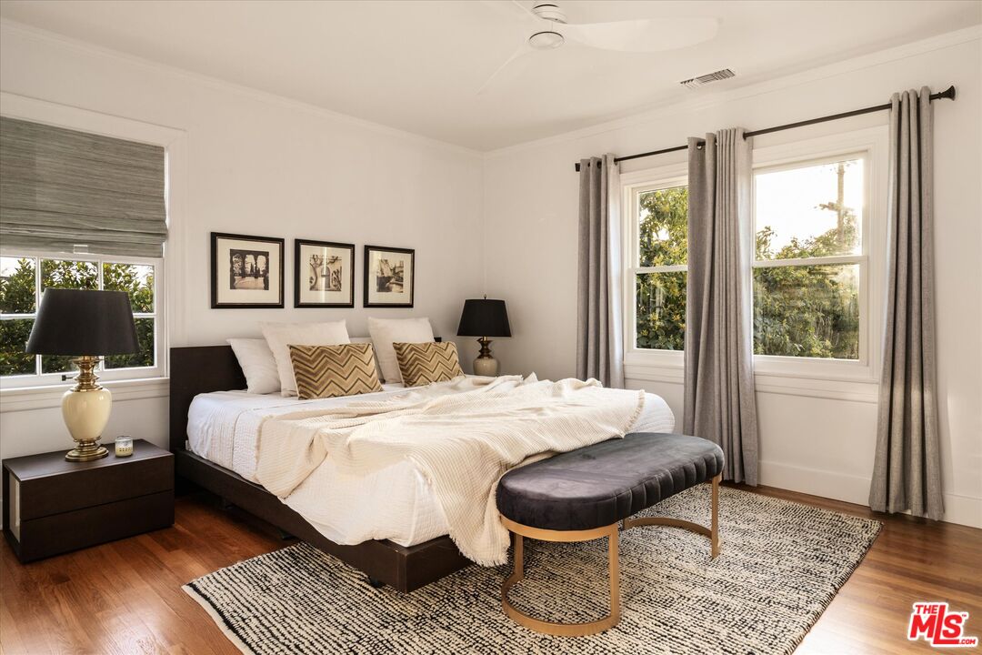 1735 Idlewood Road Glendale, CA 91202 - Photo 22 of 64 a bed room with a bed and a chair