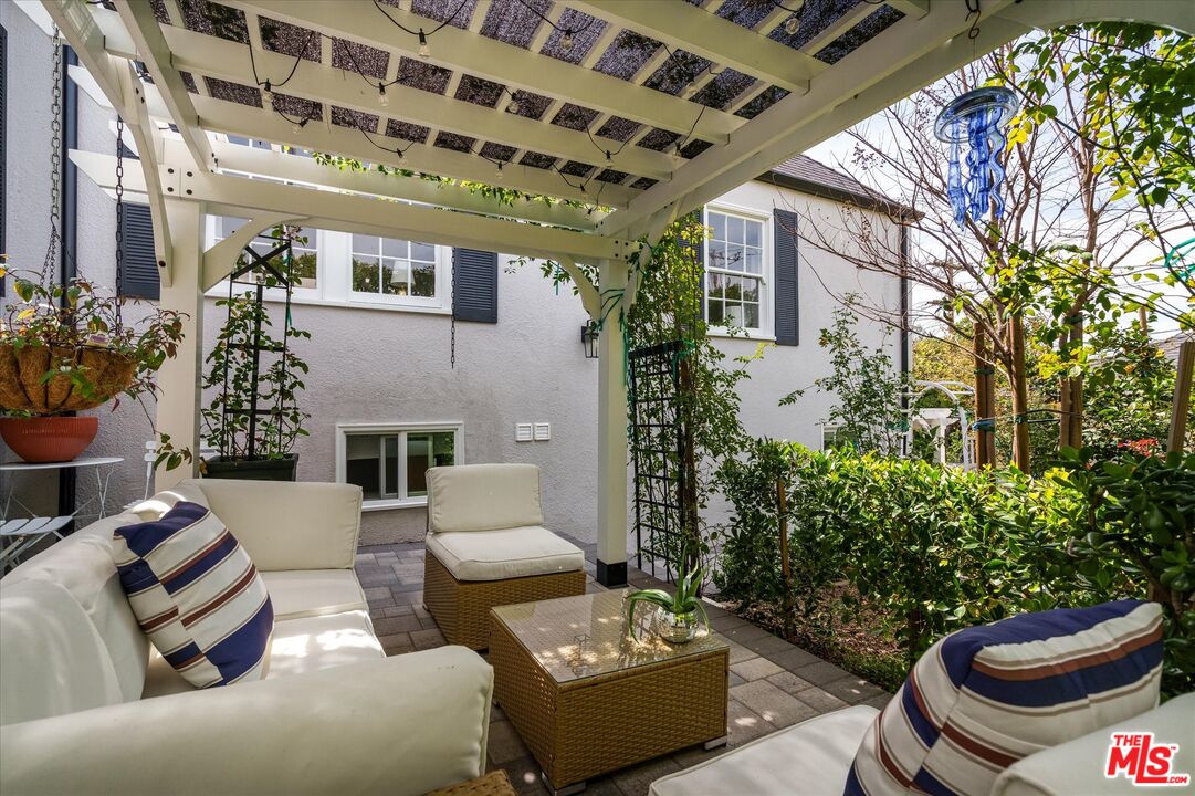 1735 Idlewood Road Glendale, CA 91202 - Photo 27 of 64 a outdoor living space with furniture and a potted plant
