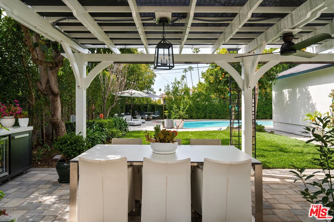 1735 Idlewood Road Glendale, CA 91202 - Photo 28 of 64 a view of a swimming pool with a patio and a yard