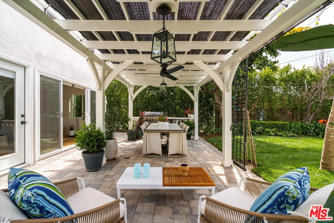 1735 Idlewood Road Glendale, CA 91202 - Photo 30 of 64 a view of a patio with couches chairs and a big yard