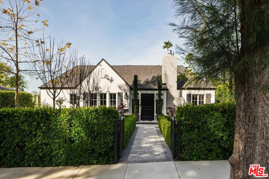 1735 Idlewood Road Glendale, CA 91202 - Photo 3 of 64 a view of a house with a small yard and plants