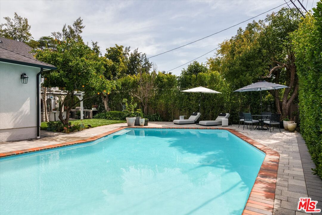 1735 Idlewood Road Glendale, CA 91202 - Photo 34 of 64 a view of swimming pool with sitting area and furniture