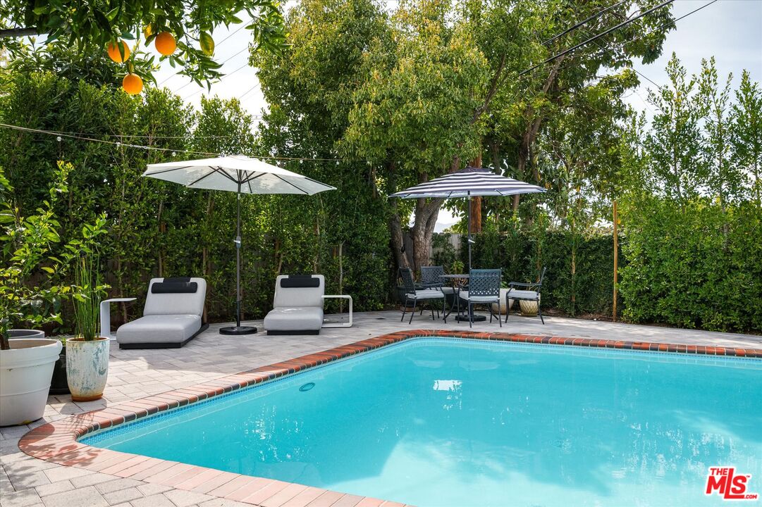 1735 Idlewood Road Glendale, CA 91202 - Photo 35 of 64 a view of a backyard with sitting area