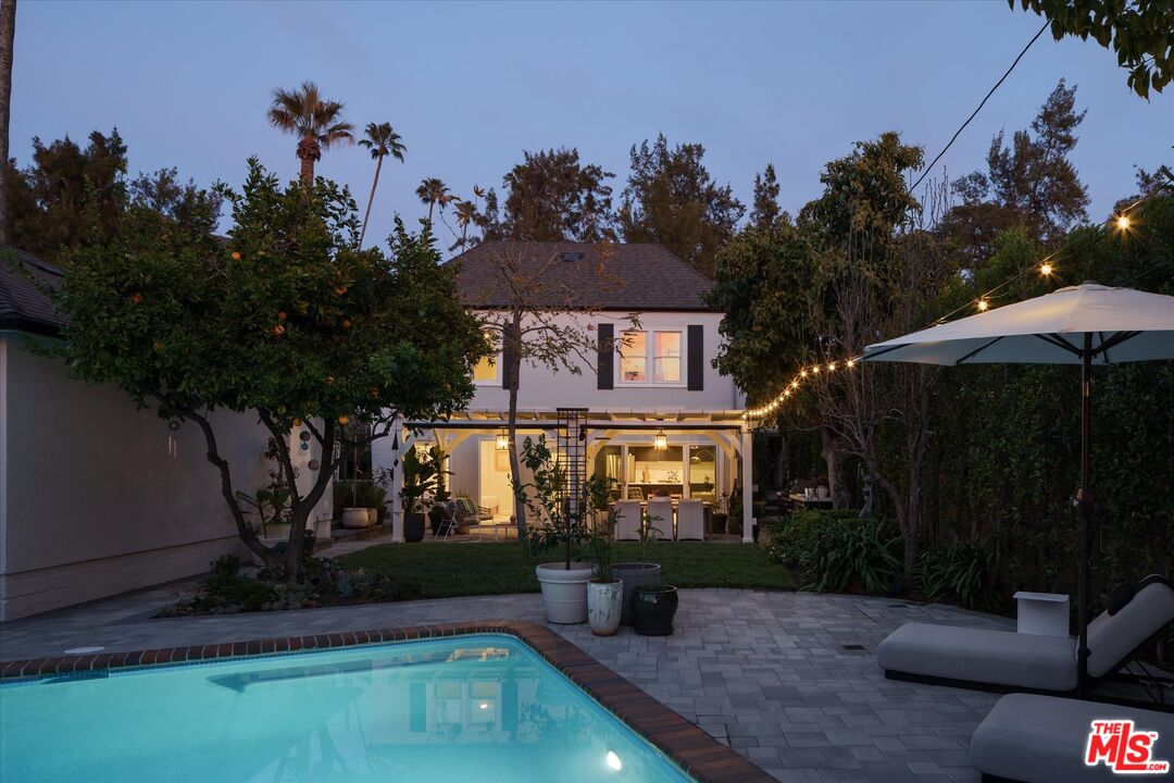 1735 Idlewood Road Glendale, CA 91202 - Photo 48 of 64 an outdoor view of house with swimming pool having outdoor seating